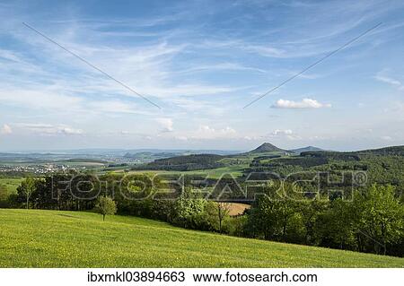 "Hegaublick lookout point with panoramic views of the volcanic cones of Hohenstoffeln, Hohenhewen, Hohentwiel and Hohenkrahen, Baden-Wurttemberg, Germany, Europe" View Large Photo Image Stock Image - "Hegaublick lookout point with panoramic views of the volcanic cones of Hohenstoffeln, Hohenhewen, Hohentwiel and Hohenkrahen, Baden-Wurttemberg, Germany, Europe". Fotosearch