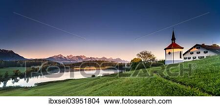 "Hergatsried Chapel with Lake Hegratsried in the morning light, near Fussen, Allgau, Bavaria, Germany, Europe" View Large Photo Image Picture - "Hergatsried Chapel with Lake Hegratsried in the morning light, near Fussen, Allgau, Bavaria, Germany, Europe". Fotosearch