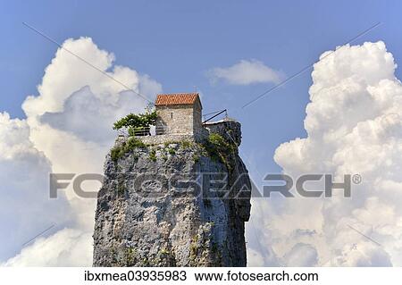 "Hermitage of a monastery on the Katskhi Rock or Katskhi Column, near Chiatura, Chiatura, Imereti region, Georgia, Asia" View Large Photo Image Stock Image - "Hermitage of a monastery on the Katskhi Rock or Katskhi Column, near Chiatura, Chiatura, Imereti region, Georgia, Asia". Fotosearch