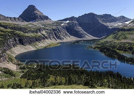 Stock Photograph - "Hidden Lake with Reynolds Mountains, Glacier National Park, Montana, United States, North America". Fotosearch