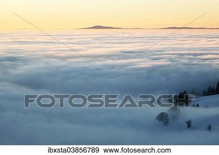 "High fog in the Rhine Valley with view on the Vosges, from Schauinsland, Black Forest, Baden-Wuerttemberg, Germany, Europe" View Large Photo Image Stock Photo - "High fog in the Rhine Valley with view on the Vosges, from Schauinsland, Black Forest, Baden-Wuerttemberg, Germany, Europe". Fotosearch