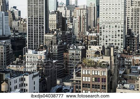 "High-rise buildings in Midtown, Manhattan, New York City, New York, United States, North America" View Large Photo Image Stock Photo - "High-rise buildings in Midtown, Manhattan, New York City, New York, United States, North America". Fotosearch