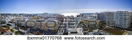 Stock Photo - "High-rise development with condominiums and apartments, many vacant due to the economic crisis, Armacao de Pera, Faro, Algarve Portugal, Europe". Fotosearch