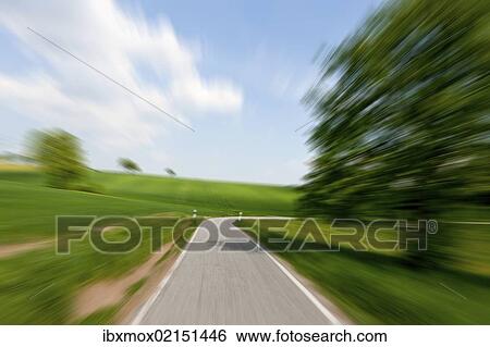 "High speed motion, country road approaching a curve, Schoenbrunn, Baden-Wuerttemberg, Germany, Europe, PublicGround, Europe" View Large Photo Image Stock Photograph - "High speed motion, country road approaching a curve, Schoenbrunn, Baden-Wuerttemberg, Germany, Europe, PublicGround, Europe". Fotosearch
