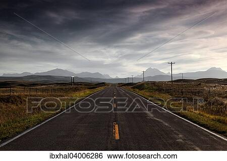 "Highway no. 89, near Browning, the mountains of Glacier National Park at the back, Montana, United States, North America" View Large Photo Image Stock Photograph - "Highway no. 89, near Browning, the mountains of Glacier National Park at the back, Montana, United States, North America". Fotosearch