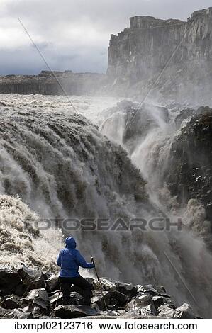 "Hiker at Dettifoss Waterfall, Joekulsargljufur, Iceland, Europe" View Large Photo Image Stock Photograph - "Hiker at Dettifoss Waterfall, Joekulsargljufur, Iceland, Europe". Fotosearch
