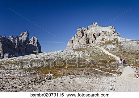 "Hikers ascending Mt Paternkofel or Paterno, Tre Cime di Lavaredo mountain group and Mt Paternkofel or Paterno in the back, Sexten, Sesto, Hochpustertal or Alta Pusteria, Dolomites, South Tyrol, Europe" View Large Photo Image Stock Photography - "Hikers ascending Mt Paternkofel or Paterno, Tre Cime di Lavaredo mountain group and Mt Paternkofel or Paterno in the back, Sexten, Sesto, Hochpustertal or Alta Pusteria, Dolomites, South Tyrol, Europe". Fotosearch