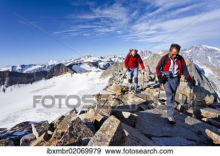 "Hikers climbling Mt Angelo Grande, Ortles area, Mt Ortles, Mt Gran Zebru and Mt Cima Vertana in the back, South Tyrol, Austria, Europe" View Large Photo Image Stock Photo - "Hikers climbling Mt Angelo Grande, Ortles area, Mt Ortles, Mt Gran Zebru and Mt Cima Vertana in the back, South Tyrol, Austria, Europe". Fotosearch