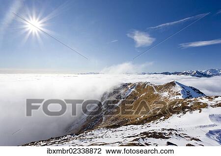 "Hikers on Grosse Laugenspitze Mountain above the Laugenalm alpine pasture, Gampen Pass, Alto Adige, Italy, Europe" View Large Photo Image Stock Image - "Hikers on Grosse Laugenspitze Mountain above the Laugenalm alpine pasture, Gampen Pass, Alto Adige, Italy, Europe". Fotosearch