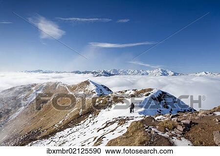 "Hikers on Grossen Laugenspitze Mountain above the Laugenalm alpine pasture, looking towards the Ultimo Mountains, Gampen Pass, Alto Adige, Italy, Europe" View Large Photo Image Stock Image - "Hikers on Grossen Laugenspitze Mountain above the Laugenalm alpine pasture, looking towards the Ultimo Mountains, Gampen Pass, Alto Adige, Italy, Europe". Fotosearch