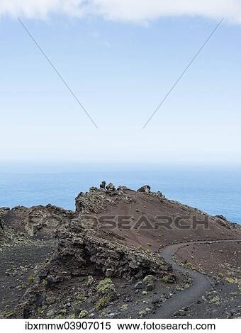 Stock Photography - "Hiking trail through a lava landscape, Southern Cape, Punta de Fuencaliente, La Palma, Canary Islands, Spain, Europe". Fotosearch