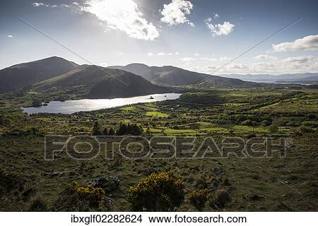 Picture - "Hills and lakes area at Healy Pass, Lackabane and Glanmore Lake, County Cork, Republic of Ireland, Europe". Fotosearch