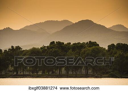 "Hills at West Lake at sunset, Xihu, Hangzhou, Zhejiang Province, China, Asia" View Large Photo Image Picture - "Hills at West Lake at sunset, Xihu, Hangzhou, Zhejiang Province, China, Asia". Fotosearch