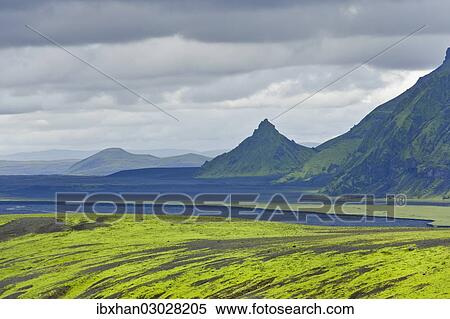 "Hills covered with moss in front of an area with black sand and a pointed mountain, view from the road into the Pakgil or Thakgil Valley, Iceland, Europe" View Large Photo Image Stock Photography - "Hills covered with moss in front of an area with black sand and a pointed mountain, view from the road into the Pakgil or Thakgil Valley, Iceland, Europe". Fotosearch