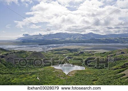 Stock Photo - "Hilly landscape with a small lake, Hvannagil, Iceland, Europe". Fotosearch
