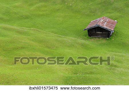 Stock Photography - "Hilly meadow with hay barn at Mt. Kranzberg, Karwendelgebirge mountains, Mittenwald, Werdenfelser Land area, Upper Bavaria, Bavaria, Germany, Europe". Fotosearch