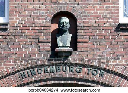 "Hindenburg bust at the Hindenburg gate, residential building with passage way to the spa gardens, Wilhelmshaven, Lower Saxony, Germany, Europe" View Large Photo Image Picture - "Hindenburg bust at the Hindenburg gate, residential building with passage way to the spa gardens, Wilhelmshaven, Lower Saxony, Germany, Europe". Fotosearch