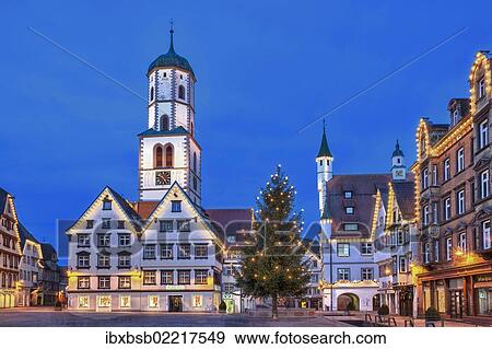 "Historic buildings, market square, St. Martin parish church, town hall, """"Des Esels Schatten"""" sculpture, Christmas tree, dusk, Biberach an der Riss, Baden-Wuerttemberg, Germany, Europe" View Large Photo Image Stock Photo - "Historic buildings, market square, St. Martin parish church, town hall, """"Des Esels Schatten"""" sculpture, Christmas tree, dusk, Biberach an der Riss, Baden-Wuerttemberg, Germany, Europe". Fotosearch