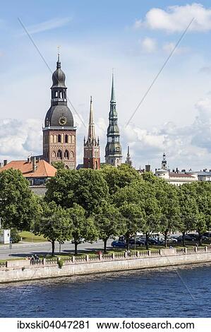 "Historic centre with the banks of the Daugava river or Western Dvina, Riga Cathedral and St. Peter's Church, Riga, Latvia, Europe" View Large Photo Image Stock Image - "Historic centre with the banks of the Daugava river or Western Dvina, Riga Cathedral and St. Peter's Church, Riga, Latvia, Europe". Fotosearch