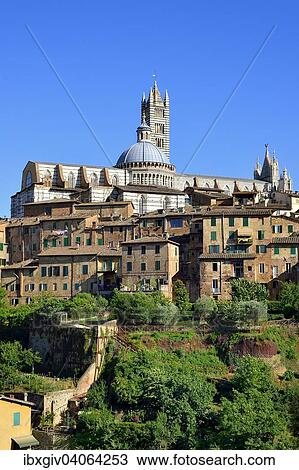 Stock Image - "Historic centre with the cathedral of Siena, Cattedrale di Santa Maria Assunta, Siena, Province of Siena, Tuscany, Italy, Europe". Fotosearch