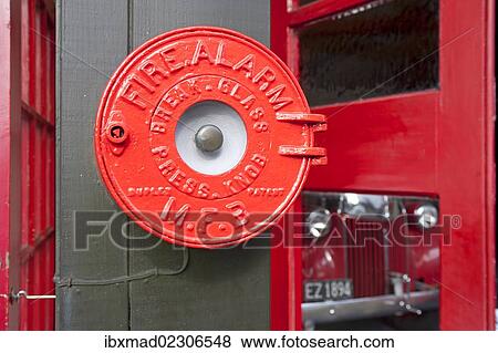 "Historic fire alarm, old fire engine at back" View Large Photo Image Stock Photo - "Historic fire alarm, old fire engine at back". Fotosearch