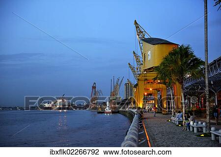 "Historic loading cranes, renovated port facility of Estacao das Docas with the promenade, restaurants and shops, Belem, Para, Brazil, South America" View Large Photo Image Stock Image - "Historic loading cranes, renovated port facility of Estacao das Docas with the promenade, restaurants and shops, Belem, Para, Brazil, South America". Fotosearch