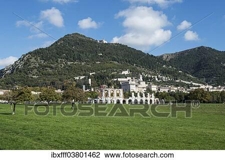 "Historic town of Gubbio with Monte Ingino and the Roman theatre, Gubbio, Province of Perugia, Umbria, Italy, Europe" View Large Photo Image Stock Image - "Historic town of Gubbio with Monte Ingino and the Roman theatre, Gubbio, Province of Perugia, Umbria, Italy, Europe". Fotosearch