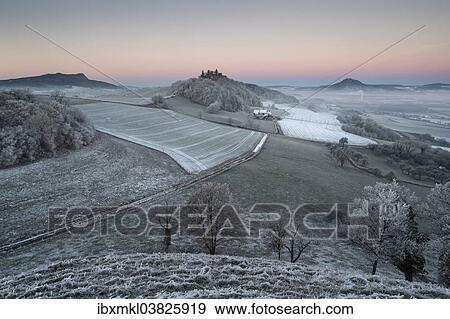 "Hoar frost covered fields and meadows in Hegau with the Hohenstoffeln Mountain, Magdeberg Mountain and Hohenhewen Mountain, left to right, Baden-Wurttemberg, Germany, Europe" View Large Photo Image Stock Photo - "Hoar frost covered fields and meadows in Hegau with the Hohenstoffeln Mountain, Magdeberg Mountain and Hohenhewen Mountain, left to right, Baden-Wurttemberg, Germany, Europe". Fotosearch