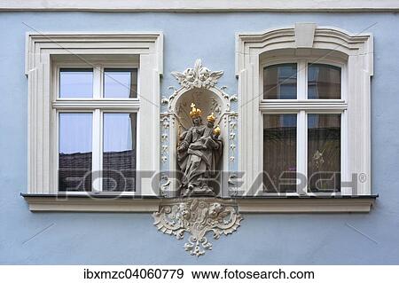 "Holy sculpture, Madonna with the baby Jesus wearing golden crowns in a wall niche of a town house, Bamberg, Upper Franconia, Bavaria, Germany, Europe" View Large Photo Image Stock Photo - "Holy sculpture, Madonna with the baby Jesus wearing golden crowns in a wall niche of a town house, Bamberg, Upper Franconia, Bavaria, Germany, Europe". Fotosearch