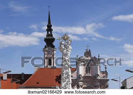 "Holy Trinity column and Franciscan Church, Rathausplatz square, St. Poelten, Mostviertel, Must Quarter, Lower Austria, Austria, Europe, PublicGround, Europe" View Large Photo Image Stock Photo - "Holy Trinity column and Franciscan Church, Rathausplatz square, St. Poelten, Mostviertel, Must Quarter, Lower Austria, Austria, Europe, PublicGround, Europe". Fotosearch