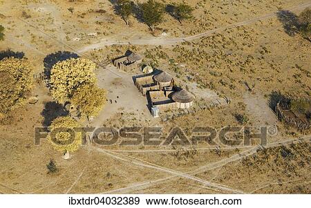 "Homesteads just outside of the protected area, aerial view, Okavango Delta, Botswana, Africa" View Large Photo Image Stock Photo - "Homesteads just outside of the protected area, aerial view, Okavango Delta, Botswana, Africa". Fotosearch