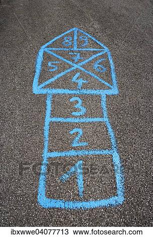 Stock Image - "Hopscotch grid on a pavement, Austria, Europe". Fotosearch