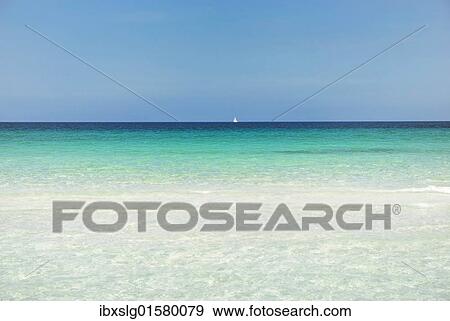 "Horizon with sailing ship, turquoise sea with sandy beach, La Cinta, Sardinia, Italy, Europe" View Large Photo Image Stock Photo - "Horizon with sailing ship, turquoise sea with sandy beach, La Cinta, Sardinia, Italy, Europe". Fotosearch