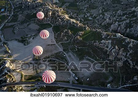 "Hot air balloons, balloon ride, Goreme, UNESCO World Heritage Site, Cappadocia, Turkey, Asia" View Large Photo Image Stock Photo - "Hot air balloons, balloon ride, Goreme, UNESCO World Heritage Site, Cappadocia, Turkey, Asia". Fotosearch