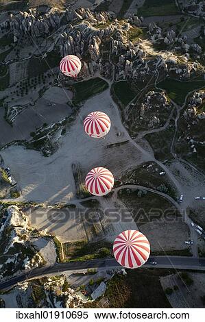 Stock Photography - "Hot air balloons, balloon ride, Goreme, UNESCO World Heritage Site, Cappadocia, Turkey, Asia". Fotosearch