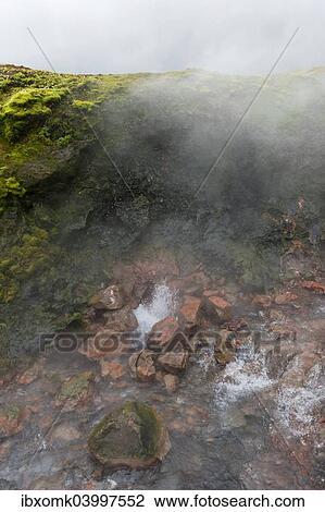 Stock Image - "Hot Spring Deildartunguhver, highest-flow hot spring of Iceland with 180 liters of boiling water per second, Reykholtsdalur, Iceland, Europe". Fotosearch