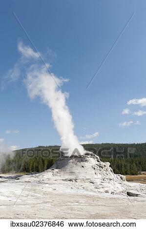 Stock Photograph - "Hot spring with a cone geyser, steam column, water vapor, Castle Geyser, Castle-Grand Area, Upper Geyser Basin, Yellowstone National Park, Wyoming, Western United States, USA, United States of America, North America". Fotosearch
