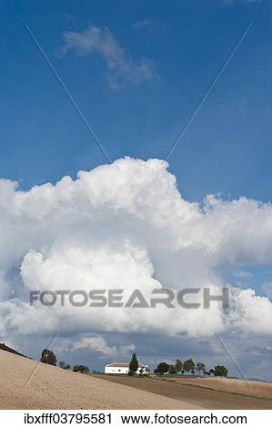 "House and fields, cloudy sky, Sierra de Cadiz, Andalusia, Spain, Europe" View Large Photo Image Stock Image - "House and fields, cloudy sky, Sierra de Cadiz, Andalusia, Spain, Europe". Fotosearch