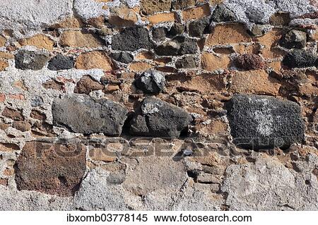 "House wall, natural stone bricks, weathered, dilapidated" View Large Photo Image Stock Photography - "House wall, natural stone bricks, weathered, dilapidated". Fotosearch