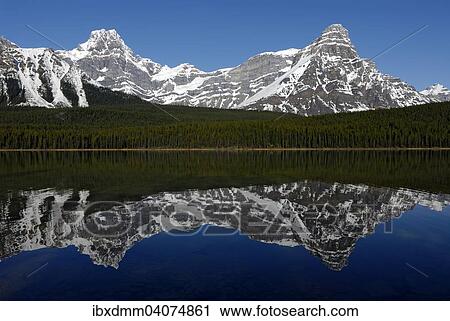 "Howse Peak and Mount Chephren, right, reflected in Waterfowl Lake, Banff National Park, Rocky Mountains, Alberta Province, Canada, North America" View Large Photo Image Stock Image - "Howse Peak and Mount Chephren, right, reflected in Waterfowl Lake, Banff National Park, Rocky Mountains, Alberta Province, Canada, North America". Fotosearch