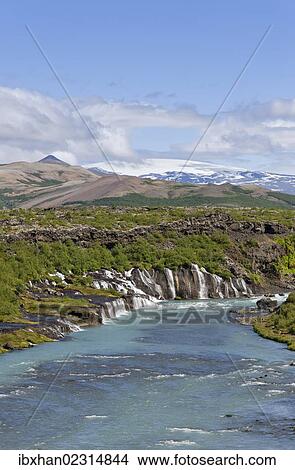 "Hraunfossar, Ok Glacier at back, Husarfell, Iceland, Europe" View Large Photo Image Picture - "Hraunfossar, Ok Glacier at back, Husarfell, Iceland, Europe". Fotosearch