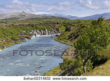 "Hraunfossar, Ok Glacier at back, Husarfell, Iceland, Europe" View Large Photo Image Stock Image - "Hraunfossar, Ok Glacier at back, Husarfell, Iceland, Europe". Fotosearch