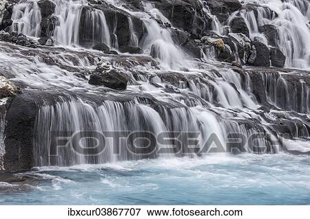 "Hraunfossar waterfalls, near Husafell, Iceland, Europe" View Large Photo Image Stock Photo - "Hraunfossar waterfalls, near Husafell, Iceland, Europe". Fotosearch