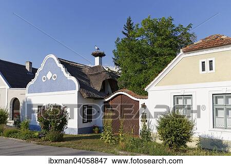 "Hufnagl house with stork's nest, Apetlon, Seewinkel, Northern Burgenland, Burgenland, Austria, Europe" View Large Photo Image Stock Photo - "Hufnagl house with stork's nest, Apetlon, Seewinkel, Northern Burgenland, Burgenland, Austria, Europe". Fotosearch