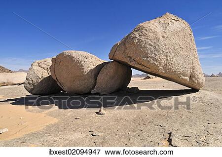 "Huge granite boulders at Tehenadou, Adrar n'Ahnet, Algeria, Sahara, North Africa, Africa" View Large Photo Image Stock Photo - "Huge granite boulders at Tehenadou, Adrar n'Ahnet, Algeria, Sahara, North Africa, Africa". Fotosearch