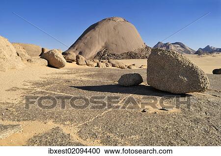 Stock Image - "Huge granite dome at Tehenadou, Adrar n'Ahnet, Adrar Ahnet, Algeria, Sahara, North Africa, Africa". Fotosearch
