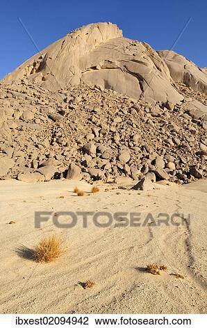 "Huge granite dome at Tehenadou, Adrar n'Ahnet, Algeria, Sahara, North Africa, Africa" View Large Photo Image Stock Image - "Huge granite dome at Tehenadou, Adrar n'Ahnet, Algeria, Sahara, North Africa, Africa". Fotosearch