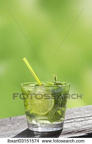 Hugo cocktail with lime and mint View Large Photo Image Picture - Hugo cocktail with lime and mint. Fotosearch