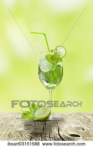 Hugo cocktail with lime and mint View Large Photo Image Stock Photo - Hugo cocktail with lime and mint. Fotosearch