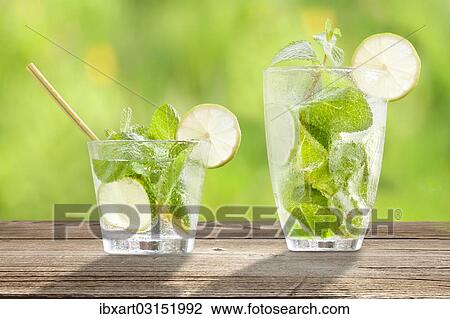 Stock Image - Hugo cocktails with lime and mint. Fotosearch